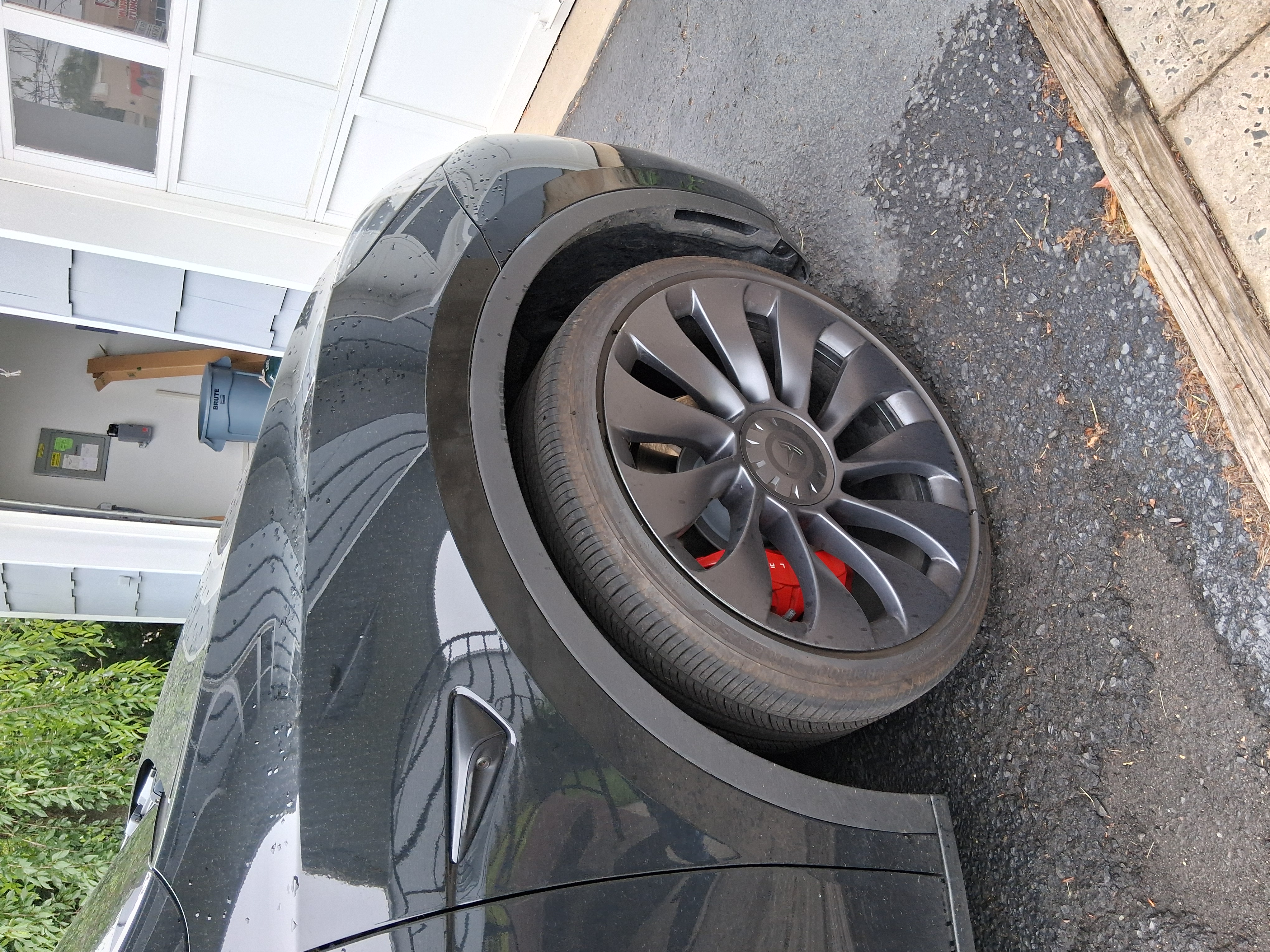Tesla Model Y wheel before professional detailing